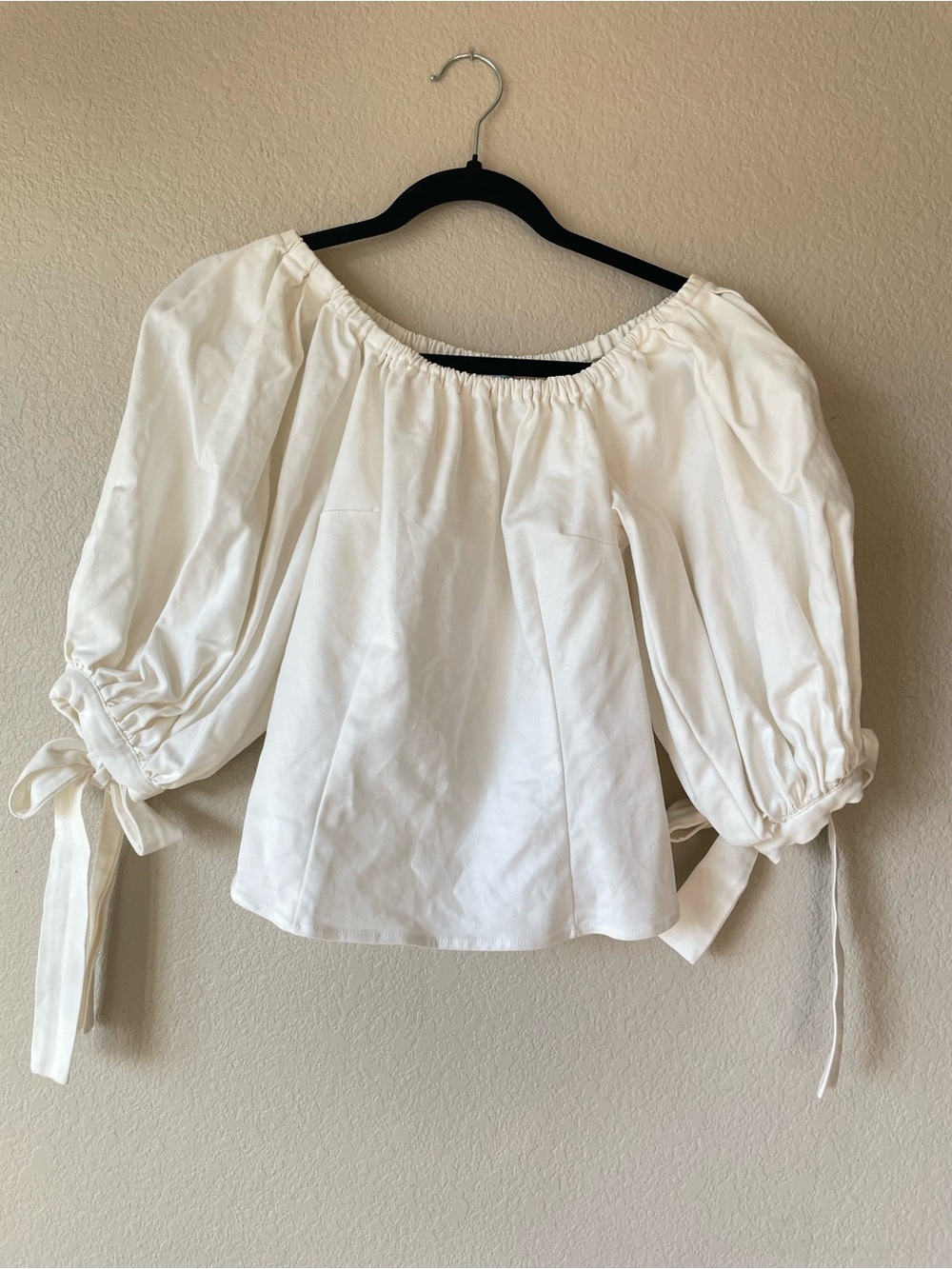CeCe White Off-The-Shoulder Dramatic Puff Sleeve Blouse and bow tie detail